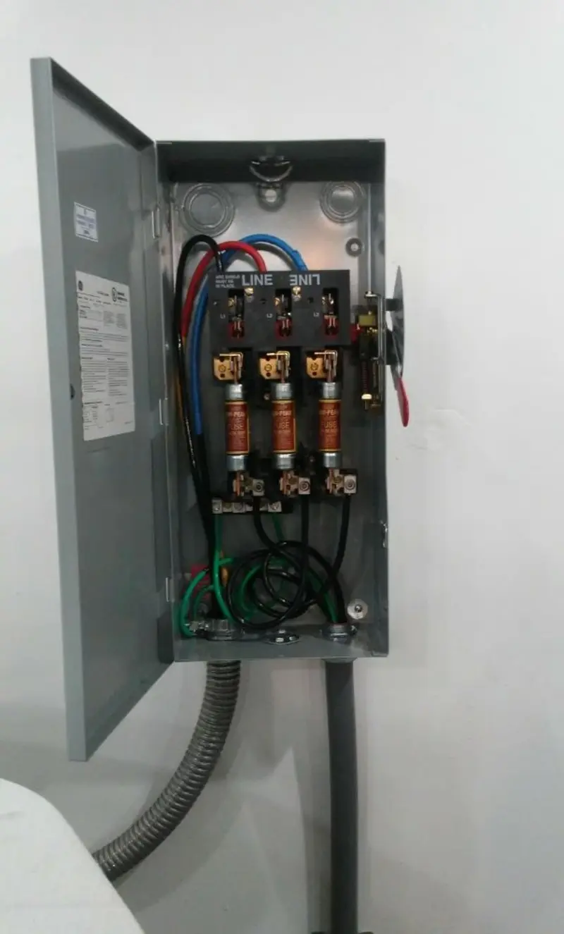 Three-phase disconnect switch installed for Smoke Detector Installation in Hull