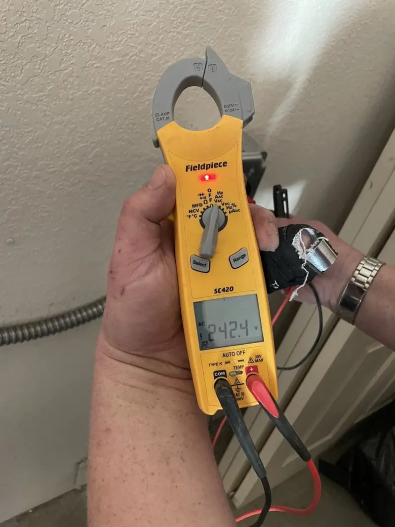 Voltage testing with clamp meter during Generator Installation in Hull